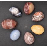 Seven decorative agate eggs, lengths ca. 2.5-3cm.