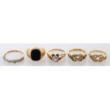 Five rings, to include: a 9ct black onyx signet ring, stamped 375 with London hallmarks for 1989,