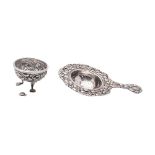 A white metal tea strainer, probably Indian, unmarked, 42grams, 13cm long,