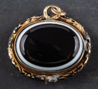 A sardonyx, black enamel and hairwork mourning pendant,