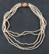 A freshwater pearl, multi-strand necklace, with articulated, seed pearl set clasp,