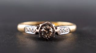 A round, brilliant-cut diamond single-stone ring, estimated diamond weight ca. 0.