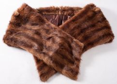 An early 20th century fur stole with sil