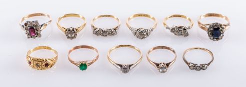 A collection of eleven gem set rings, in