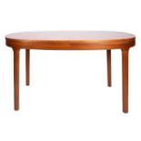 A teak extending dining table and six ch