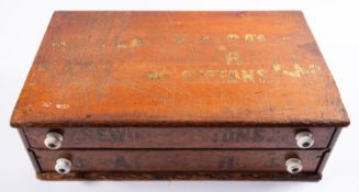 An early 20th century shop counter case for 'Clark & Co.
