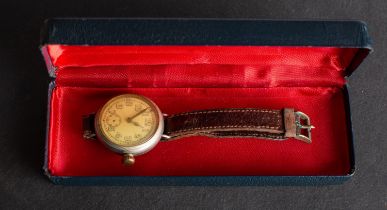 A WWI period wristwatch, unsigned, the dial with Arabic numerals and luminous hands in a steel case,