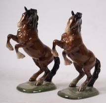 Beswick: A pair of Rearing Stallions, black circular mark,(2).