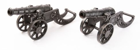 A pair of cast iron model cannon,