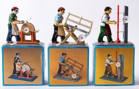 A boxed group of three Wilseco tinplate workmen,