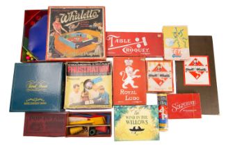 A collection of various early 20th century and later board games, including 'Whirletto',