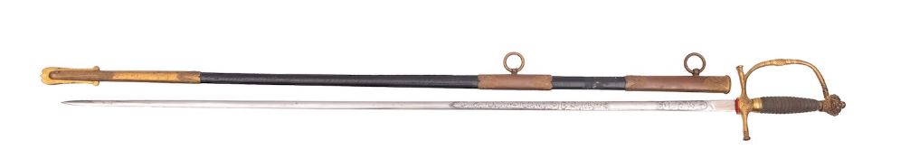 A late Victorian/Edwardian Court sword, the straight acid etched blade over a gilt brass hilt,