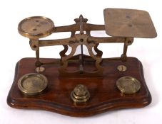 A set of brass and mahogany postal scales, maker John Heath, Birmingham,