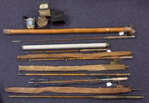 A group of five various split cane fishing rods, one in a bamboo and leather rod case,