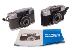 An Olympus Penn EE half- frame camera, serial number 724703 with grey body and 22.