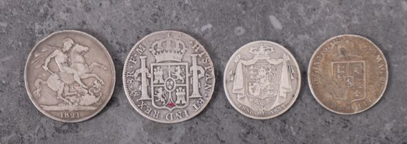 A 1689 half crown, 1837 half crown, 1821 crown and 1791 8 reales.