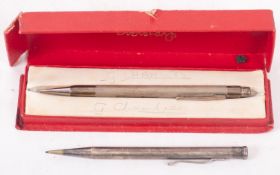 A silver Eversharp propelling pencil,