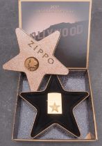 A boxed Zippo 'Hollywood's Leading Light' 2001 commemorative lighter,