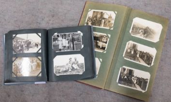 Two early 20th century postcard albums and contents, mainly portraits, group outings, charabangs,