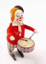 A Schuco tinplate clockwork Drumming Clown,