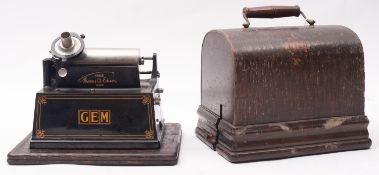 An Edison Gem Model C Phonograph, serial number 314017C, in an oak veneered case.