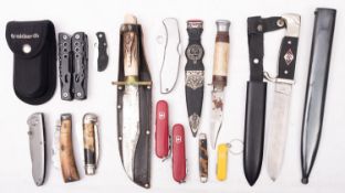 A group of various pocket knives and pen knives,