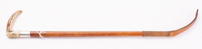 A silver mounted antler handled riding crop, maker Swain & Adeney for Champion & Wilson, London.