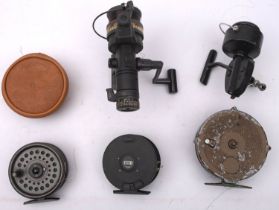 An Intrepid Rimfly King Size fly reel, together with two other fly reels,