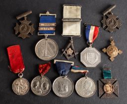 A group of Victorian and later Jubilee, Long Service and Association medals,