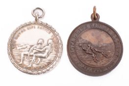 A Royal Life Saving Society silver proficiency medal to E G Hawkins,