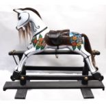 A 20th century wooden rocking horse,