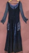 Susan Small, A blue velvet evening dress, with cotton sleeves and pleated silk panel to hips.