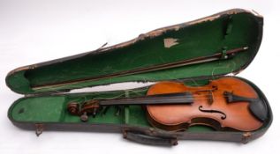 An early 20th Century violin, bearing a handwritten paper label, Carlo Art Saratilli Cecit 1913,