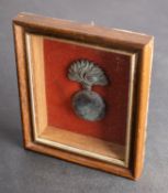 Of Waterloo Interest, A French Grenadiers brass badge, framed and glazed,