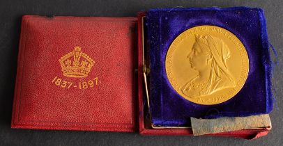 A yellow metal Victorian 1837-1897 Jubilee Medallion, obverse with young head and legend,