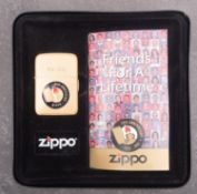 A Zippo 70th Anniversary 1932-2002 lighter, in original tin with booklet.