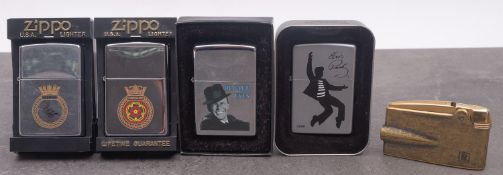 A Zippo 'Elvis Jailhouse' lighter and a Zippo 'Frank Sinatra 'Ol' Blue Eyes' lighter,