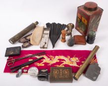 A group of miscellaneous collectables, including a biscuit tin, a leather cigar case, a brass horn,
