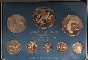 A cased set 'Coinage of Belize', maker Franklin Mint.