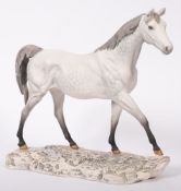 A large walking Beswick dapple grey horse, on base, in matte glaze,