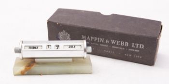 An Art Deco silver plated and onyx perpetual desk calendar, in an associated Mappin & Webb box. 12.