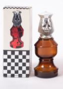A late 20th century Avon after shave, chess set,