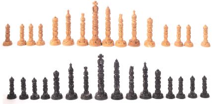 A late 20th century Indian carved sandalwood chess set, 13cm high.
