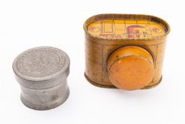 A WWI tin in the form of a tank, together with a tooth powder box, late 19th Century (2).