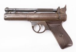 A Webley 'Senior' .22 calibre air pistol, serial number S13205, with two-piece brown chequered grip.