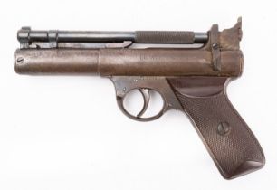 A Webley 'Senior' .22 calibre air pistol, serial number S13205, with two-piece brown chequered grip.