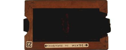 'Death on horseback' [two black slides move to reveal figure] Maker unknown (6 3/4 x 4 x 3/8