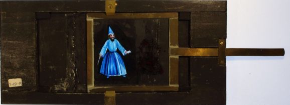 'Wizard's cloak changes to show playing cards' Maker unknown; 9¾ x 4½ x ½ inches, single slip