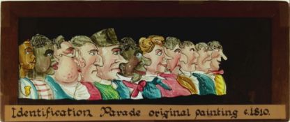 'Row of eleven faces' Maker unknown (8 7/8 x 3 3/4 x 3/8 inches)