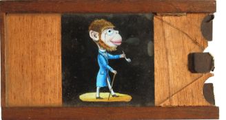 'Monkey smoking pipe' [arm and pipe move, eye moves, smoke appears] Maker unknown (7 x 3 7/8 x 5/8